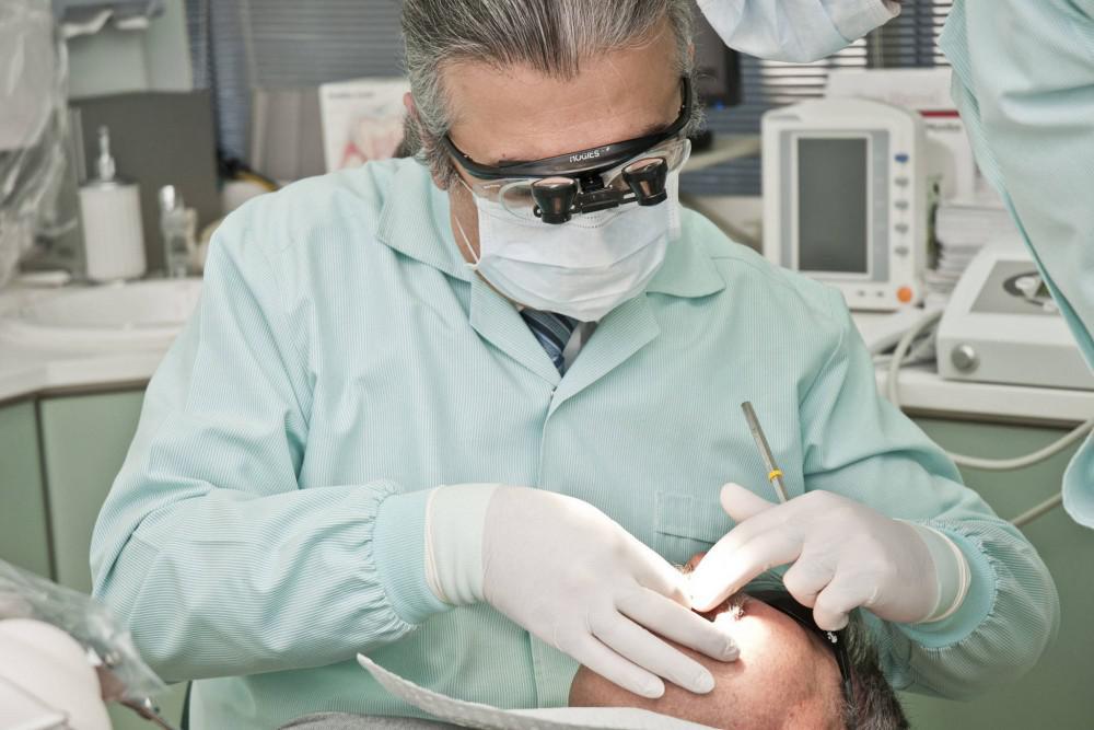 Dentist performing a dental treatment on a patient